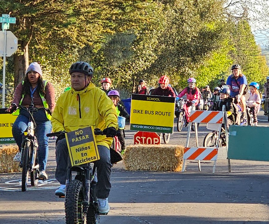 A warm illustration of children walking and biking to school together through a safe neighborhood route.